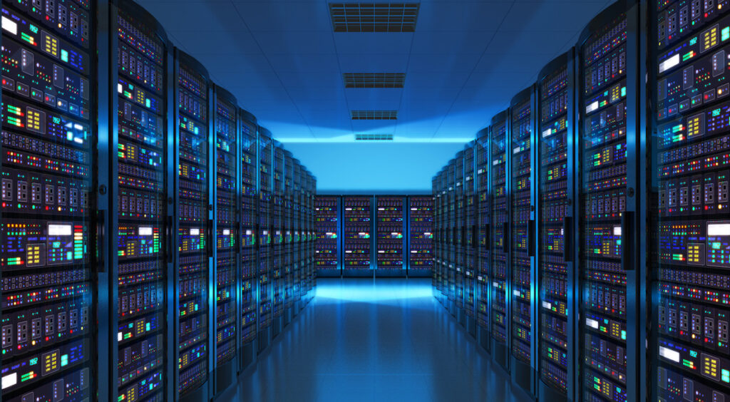 Modern web network and internet telecommunication technology, big data storage and cloud computing computer service business concept: server room interior in datacenter in blue light